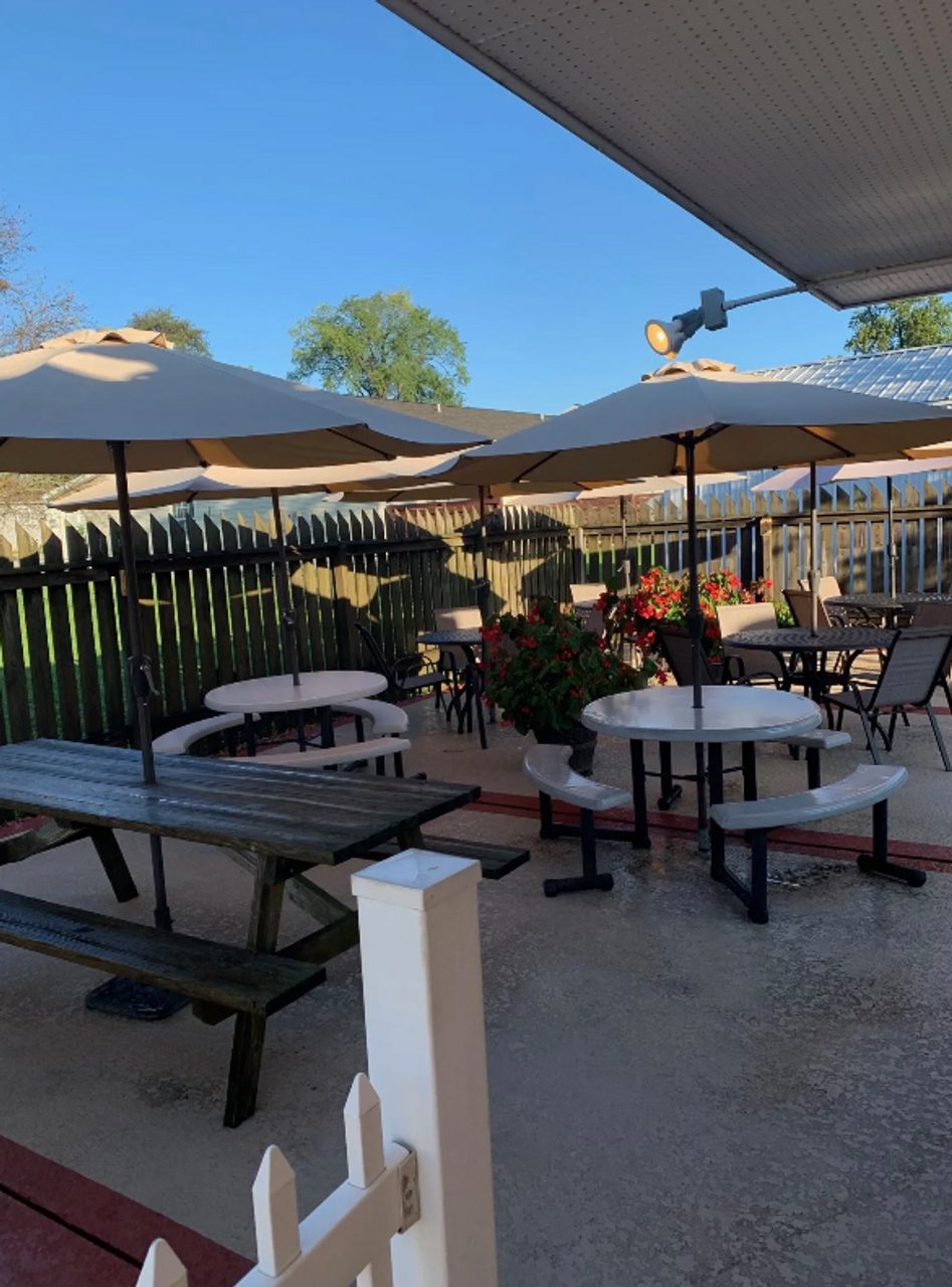 Picnic tables and umbrellas on the Cruiser's patio